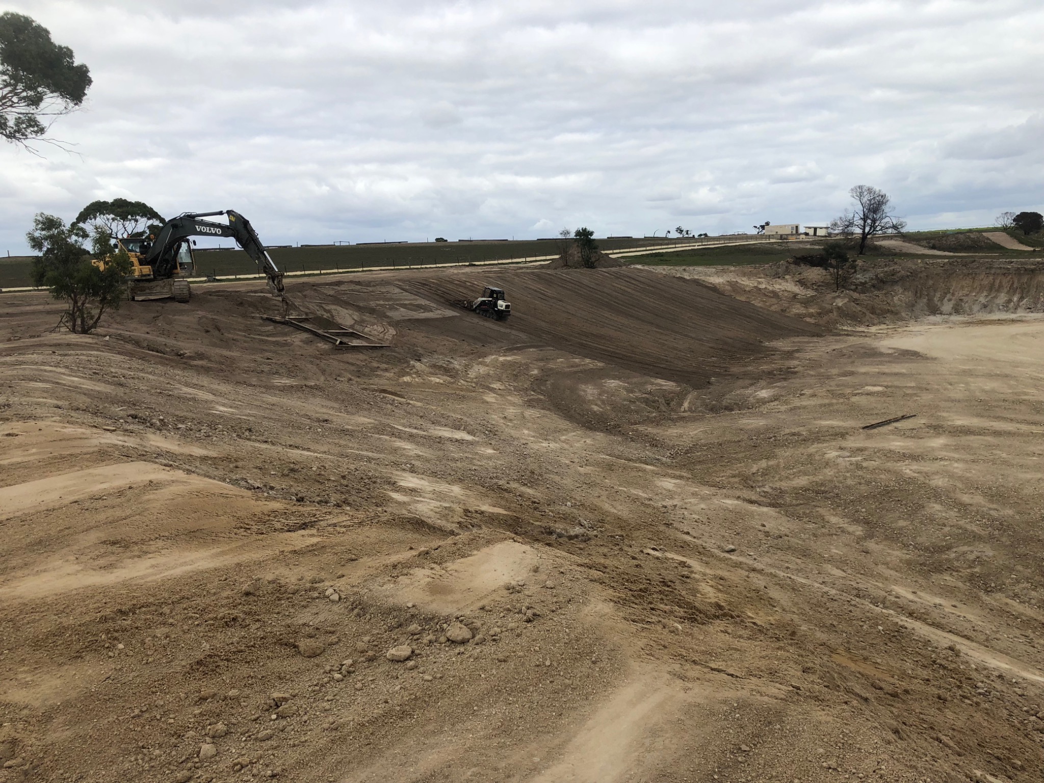 Excavator and loader across the Dirt Daze riding site